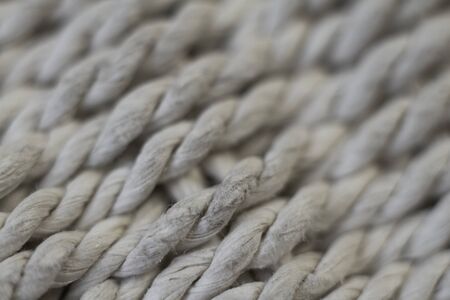 Natural background, extremely closeup surface of woven threads, selective focusの写真素材