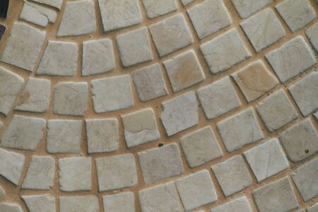 Texture of beige. Textured backdrop. Decorative plaster walls, external decoration of facade.の写真素材