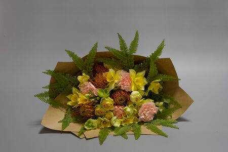 Beautiful bouquet in vintage style, light grey background, selective focusの写真素材