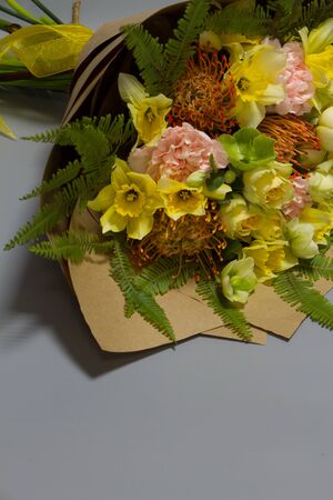 Beautiful bouquet in vintage style, light grey background, selective focusの写真素材
