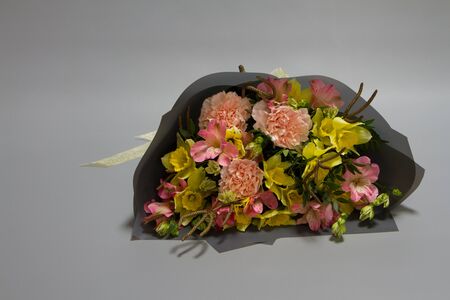 Beautiful bouquet in vintage style, light grey background, selective focusの写真素材