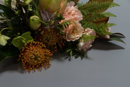 Wedding or greeting bouquet in vintage style, light grey background, selective focusの写真素材
