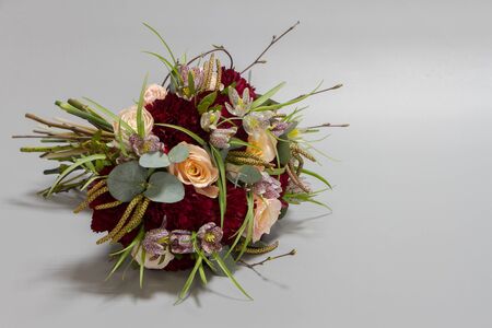 Beautiful bouquet in vintage style, light grey background, selective focusの写真素材