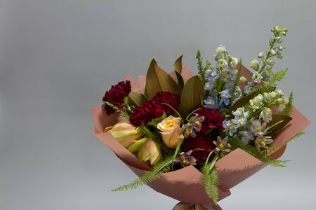 Beautiful bouquet in vintage style, light grey background, selective focusの写真素材