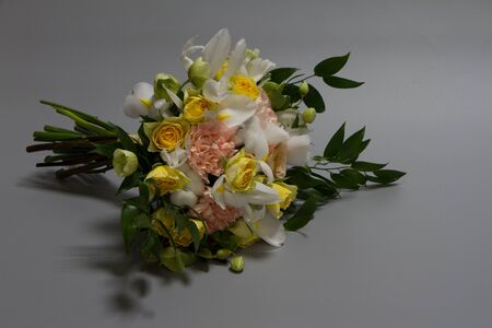 Wedding or greeting bouquet in vintage style, light grey background, selective focusの写真素材