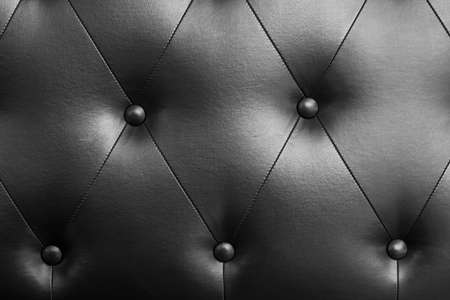 Black leather texture decorate backdrop, coach coupler on black leather, selective focusの写真素材