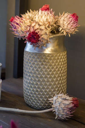 Florist shop modern interior, shelves with vases of dried flowers, bouquets of dried flowers, selective focusの写真素材