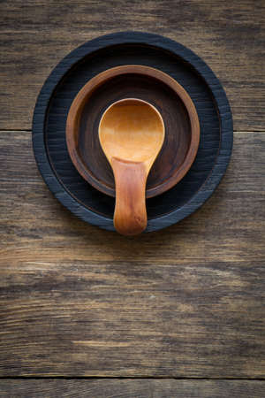 Top view cute little wooden spice spoon inside of two cup holders on wooden table, eco friendly cutlery concept, selective focusの写真素材