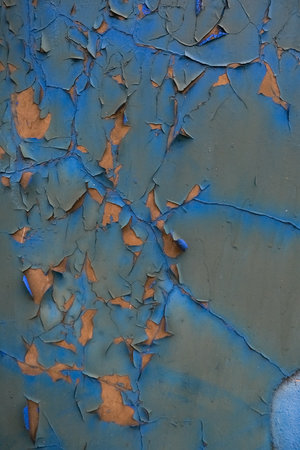 Rough textured blue wall with stains, selective focusの写真素材