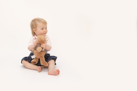 girl with toy on white backgroundの写真素材