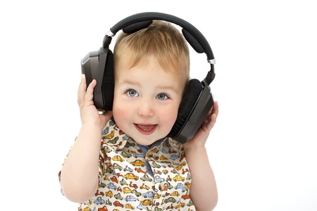 little boy in headphonesの写真素材