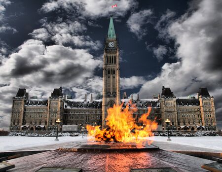 Canada's cetennial flame and parliament buildingの写真素材