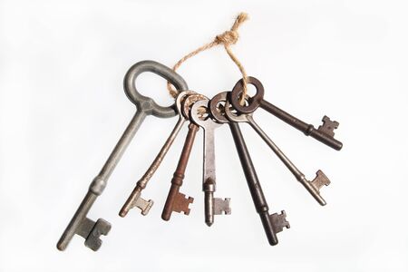 A view of vintage keys on white background