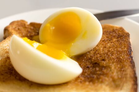 Soft boiled egg on toastの写真素材