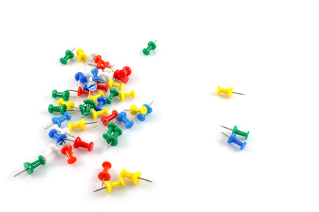 Colorful pushpins on white backgroundの写真素材