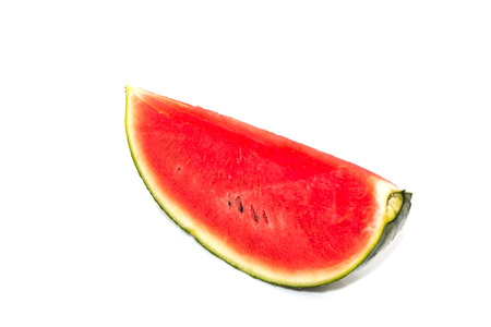 Red watermelon slice into pieces white background.の写真素材