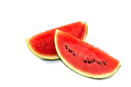 Red watermelon slice on white background.の写真素材
