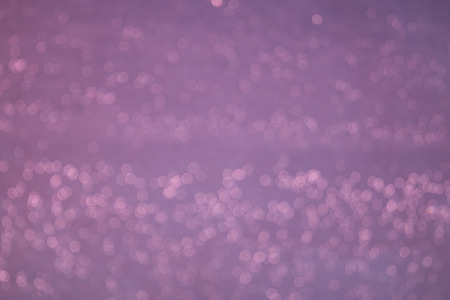 Bokeh purple lights abstract backgroundの写真素材