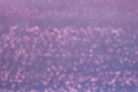Bokeh purple lights abstract backgroundの写真素材