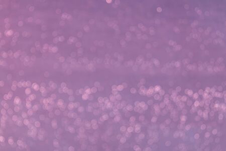 Bokeh purple lights abstract backgroundの写真素材