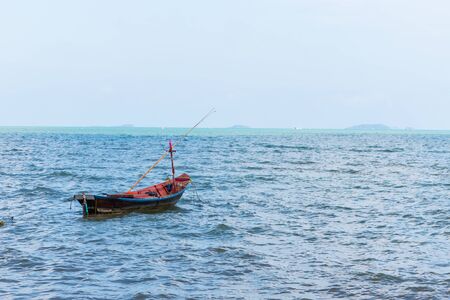 Small fishing boats on the sea backgroundの写真素材