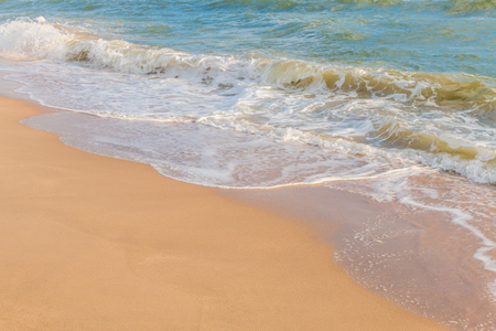 Soft wave of the sea on the sandy beachの写真素材