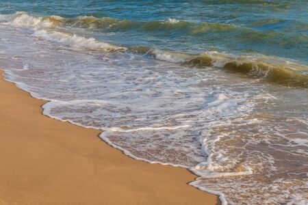 Soft wave of the sea on the sandy beachの写真素材