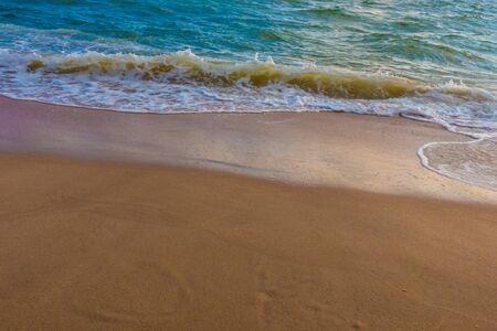 Wave of the sea on the sand beach for bacground