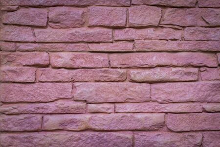 texture of red brown rough brick wall backgroundの写真素材