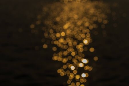 Gold bokeh backgroundの写真素材