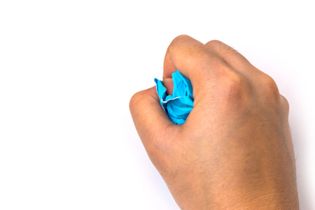 Hand crumpled paper, isolated on white backgroundの写真素材