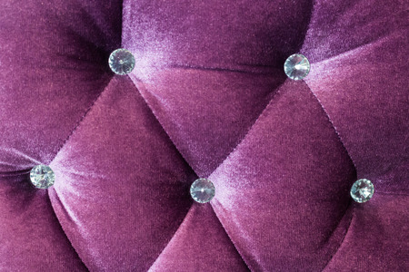 Luxury purple velvet cushion close-up backgroundの写真素材