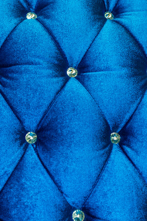 Luxury  blue velvet cushion close-up backgroundの写真素材