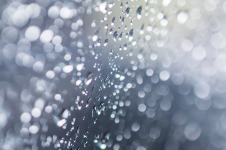 Drops of water on glass Background bokehの写真素材