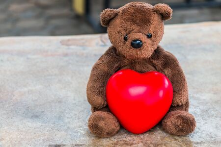 Teddy Bear Heart-shaped Pillow in Valentine's Dayの写真素材