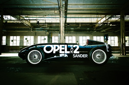 Side view of the Opel Rak 2 rocket car oldtimer in an old industrial buildingのeditorial素材
