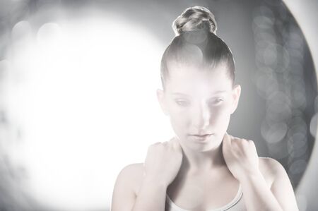 Sexy high fashion cosmetic girl with bright lens flareの写真素材