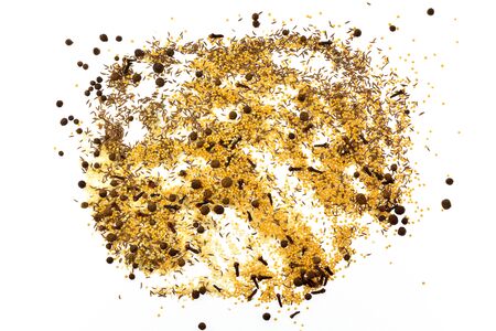Seeds, spices, grains woken and mixed with each other on a white backgroundの写真素材