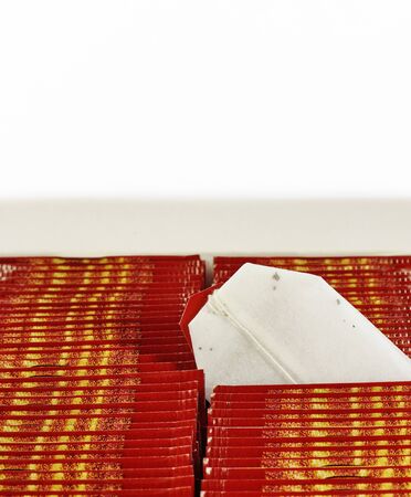 One tea bag packaging is top on a white backgroundの写真素材