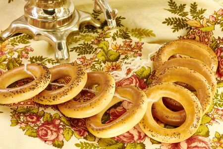 Related bagels with poppy seeds on a napkinの写真素材