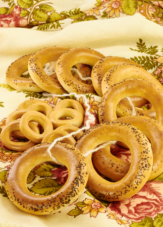 Related bagels with poppy seeds on a napkinの写真素材