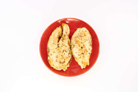 Fish stew in a plate on a white backgroundの写真素材