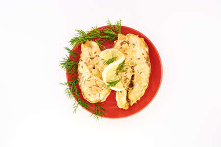Fish stew in a plate on a white backgroundの写真素材