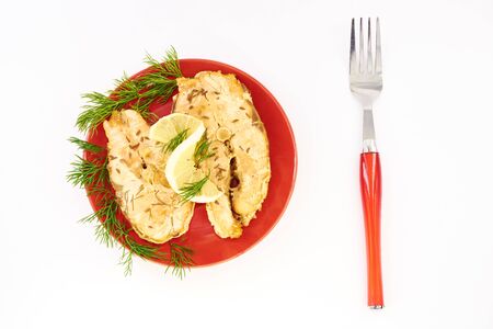 Fish stew in a plate on a white backgroundの写真素材