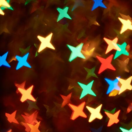 Blurred colored pieces on a brown backgroundの写真素材