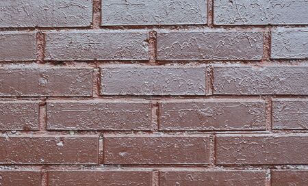 Background of brown paint painted brick wall