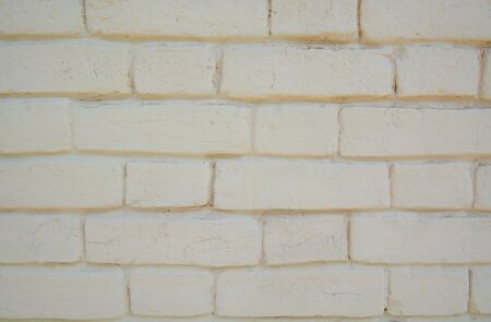 Background of the painted brick wall with white paintの写真素材