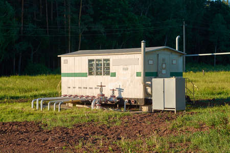 Spray oil pumping station in the summerの写真素材