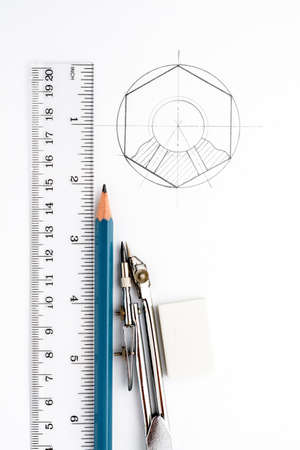Accessories for drawing on a white sheet of paperの写真素材