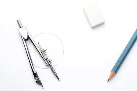 Accessories for drawing on a white sheet of paperの写真素材